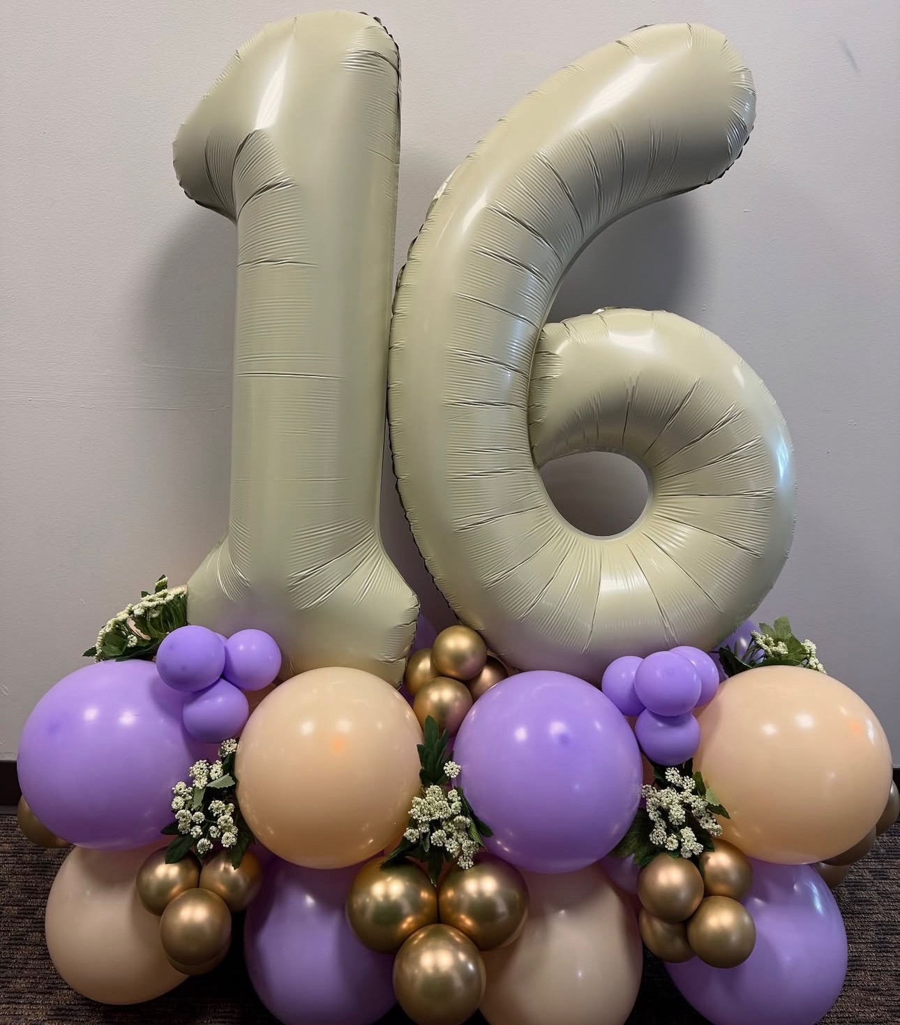 Lavender, peach and gold Sweet 16 balloon centerpiece
